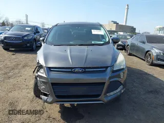 2013 Ford Escape SE with VIN 1FMCU9GX8DUD58286, listed as a IAAI auction lot 41797161 with 189,467 mi miles. Bid and sale history available at carsss.com. Image 12.