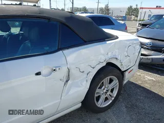 2014 Ford Mustang V6 with VIN 1ZVBP8EM9E5297226, listed as a IAAI auction lot 41627327 with 141,750 mi miles. Bid and sale history available at carsss.com. Image 6.