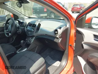 2012 Chevrolet Sonic LT with VIN 1G1JC6SH9C4128132, listed as a IAAI auction lot 42632261 with 160,029 mi miles and . Bid and sale history available at DreamBid. Image 5.