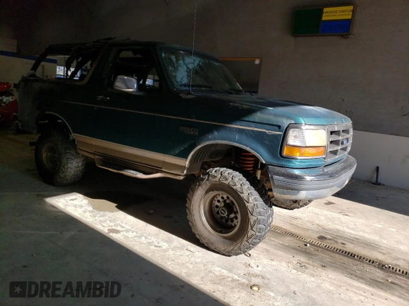 1996 Ford Bronco Custom with VIN 1FMEU15H6TLA69143, listed as a Copart auction lot 84719144 with Not Provided miles and Non Repairable. Bid and sale history available at DreamBid. Image 4.