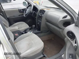 2006 Hyundai Santa Fe GLS with VIN KM8SC13D26U079706, listed as a IAAI auction lot 42464991 with 133,735 mi miles and . Bid and sale history available at DreamBid. Image 5.