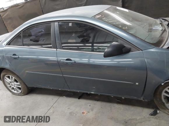 2006 Pontiac G6 6-Cyl z VIN 1G2ZG558464257988, wystawiony jako IAAI lot #42499674 z przebiegiem Nie podano mil oraz . Historia ofert i sprzedaży dostępna na DreamBid. Obrazek 14.