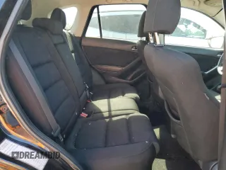2016 Mazda CX-5 Touring z VIN JM3KE2CY5G0617516, wystawiony jako Copart lot #56421005 z przebiegiem 110 739 mil mil oraz Szkoda całkowita • Salvage title. Historia ofert i sprzedaży dostępna na DreamBid. Obrazek 11.