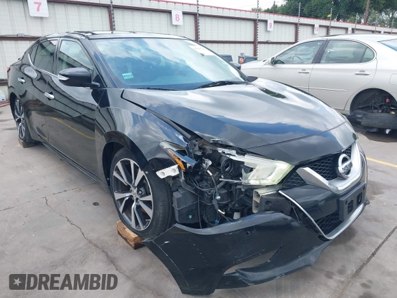 2017 Nissan Maxima SV with VIN 1N4AA6AP2HC401856, listed as a IAAI auction lot 42147308 with 195,992 mi miles and . Bid and sale history available at DreamBid. Image 1.