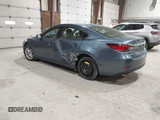 2014 Mazda 6 i Sport with VIN JM1GJ1U61E1148983, listed as a IAAI auction lot 41977553 with 100,668 mi miles and . Bid and sale history available at DreamBid. Image 3.