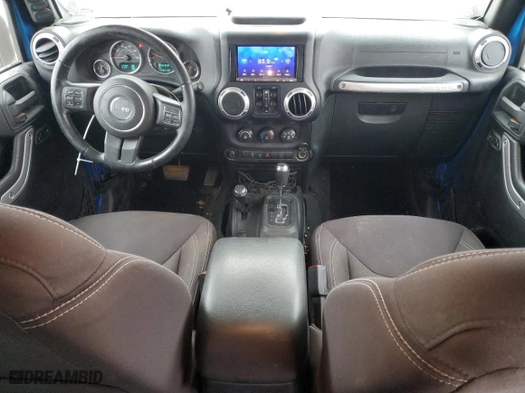 2015 Jeep Wrangler Unlimited Sahara with VIN 1C4BJWEGXFL526853, listed as a Copart auction lot 44904025 with 110,110 mi miles and Salvage Title. Bid and sale history available at carsss.com. Image 8.