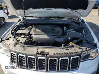2021 Jeep Grand Cherokee Laredo E with VIN 1C4RJEAGXMC719497, listed as a Copart auction lot 60830315 with 3,873 mi miles and Salvage title. Bid and sale history available at DreamBid. Image 12.