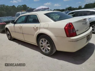 2009 Chrysler 300 Touring z VIN 2C3KA53V09H594340, wystawiony jako Copart lot #57789525 z przebiegiem 166 216 mil mil oraz Szkoda całkowita • Salvage title. Historia ofert i sprzedaży dostępna na DreamBid. Obrazek 2.