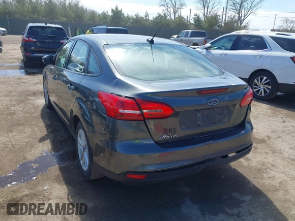 2017 Ford Focus SE with VIN 1FADP3F26HL229452, listed as a IAAI auction lot 41882192 with 83,499 mi miles. Bid and sale history available at carsss.com. Image 3.