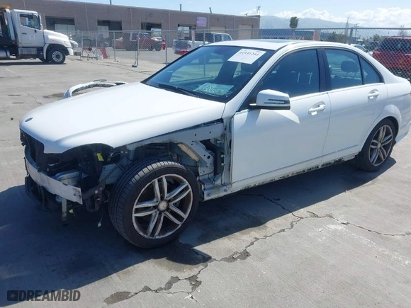 2014 Mercedes-Benz C-Class C 250 Sport with VIN WDDGF4HB8EA930990, listed as a IAAI auction lot 41931264 with 129,234 mi miles. Bid and sale history available at carsss.com. Image 2.