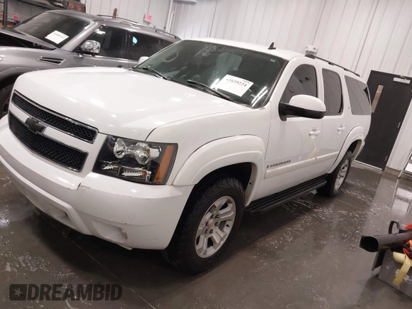 2007 Chevrolet Suburban LT with VIN 1GNFK16307J240138, listed as a IAAI auction lot 42039221 with 212,689 mi miles and . Bid and sale history available at DreamBid. Image 21.