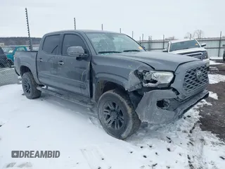 2020 Toyota Tacoma SR with VIN 5TFAX5GN2LX188420, listed as a IAAI auction lot 41514779 with 79,737 mi miles and . Bid and sale history available at DreamBid. Image 1.