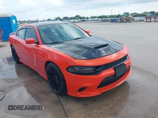 2020 Dodge Charger Scat Pack z VIN 2C3CDXGJ8LH122098, wystawiony jako IAAI lot #42250131 z przebiegiem 64 566 mil mil oraz . Historia ofert i sprzedaży dostępna na DreamBid. Obrazek 1.