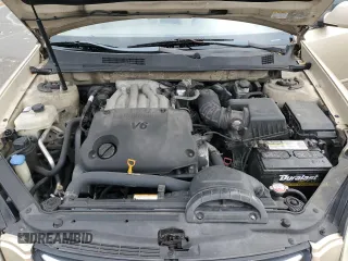 2008 Kia Optima LX z VIN KNAGE124385198719, wystawiony jako Copart lot #55449255 z przebiegiem 156 972 mil mil oraz Szkoda całkowita • Salvage title. Historia ofert i sprzedaży dostępna na DreamBid. Obrazek 11.