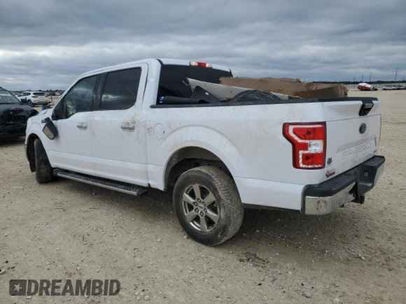 2020 Ford F-150 XL with VIN 1FTEW1CP4LKD98311, listed as a Copart auction lot 87605575 with 153,353 mi miles and Salvage Title. Bid and sale history available at carsss.com. Image 2.