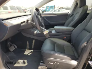 2024 Tesla Model Y Long Range with VIN 7SAYGDEEXRA253111, listed as a Copart auction lot 60929295 with 16,423 mi miles and Salvage title. Bid and sale history available at DreamBid. Image 7.