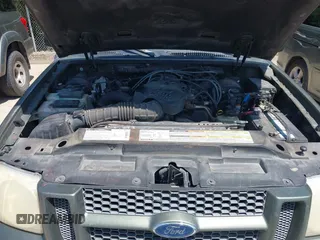 2001 Ford Explorer Sport Trac with VIN 1FMZU67E61UB92823, listed as a IAAI auction lot 42513900 with 186,525 mi miles and . Bid and sale history available at DreamBid. Image 10.