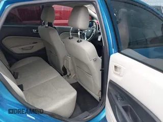 2016 Ford Fiesta SE with VIN 3FADP4BJXGM156859, listed as a IAAI auction lot 42119154 with 74,157 mi miles and . Bid and sale history available at DreamBid. Image 8.