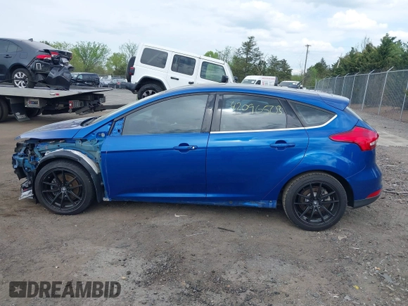 2018 Ford Focus Titanium z VIN 1FADP3N26JL325931, wystawiony jako IAAI lot #42096503 z przebiegiem 106 338 mil mil oraz . Historia ofert i sprzedaży dostępna na DreamBid. Obrazek 14.