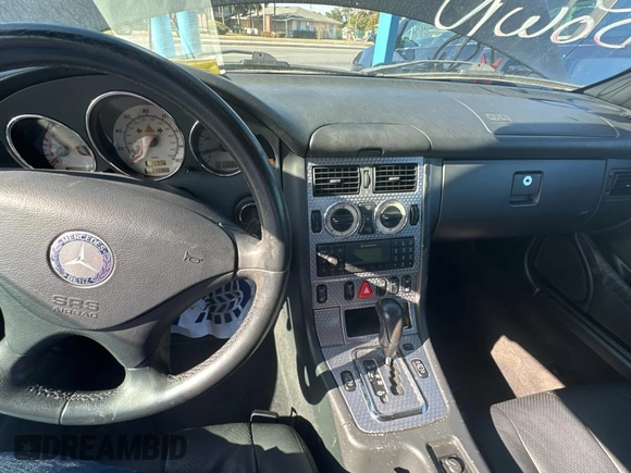 2002 Mercedes-Benz SLK-Class 2.3L Kompressor with VIN WDBKK49FX2F265220, listed as a Copart auction lot 84038354 with 90,860 mi miles and Clean Title. Bid and sale history available at carsss.com. Image 9.