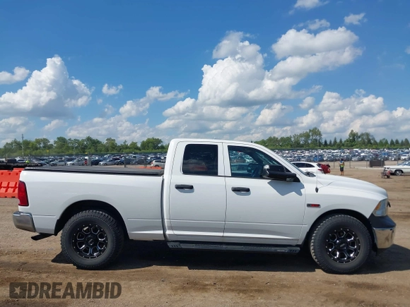2015 Ram 1500 Tradesman z VIN 1C6RR7FM9FS544341, wystawiony jako IAAI lot #42604512 z przebiegiem 198 807 mil mil oraz . Historia ofert i sprzedaży dostępna na DreamBid. Obrazek 13.
