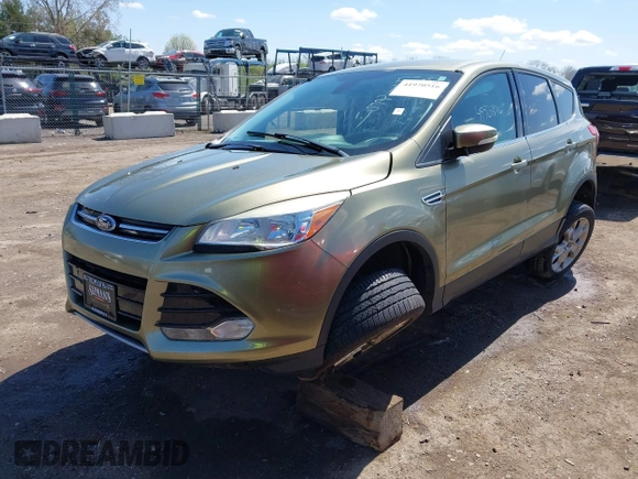 2013 Ford Escape SEL with VIN 1FMCU0HX1DUD51254, listed as a IAAI auction lot 41970516 with 83,616 mi miles. Bid and sale history available at carsss.com. Image 2.