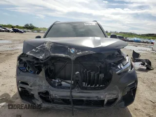 2021 BMW X5 M50i with VIN 5UXJU4C05M9G90231, listed as a Copart auction lot 87257854 with 54,704 mi miles and Non Repairable. Bid and sale history available at carsss.com. Image 5.