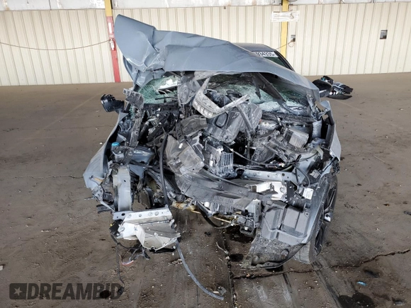 2022 Honda Civic Sport z VIN 2HGFE2F52NH509652, wystawiony jako Copart lot #54934335 z przebiegiem Nie podano mil oraz Szkoda całkowita • Salvage title. Historia ofert i sprzedaży dostępna na DreamBid. Obrazek 5.