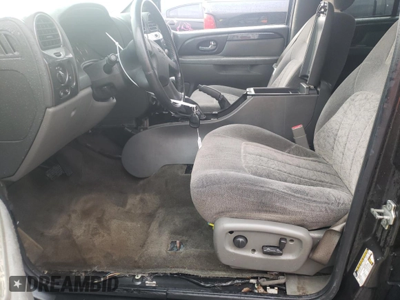 2004 GMC Envoy SLT with VIN 1GKDT13S042310076, listed as a Copart auction lot 79965854 with 220,506 mi miles and Salvage Title. Bid and sale history available at carsss.com. Image 7.