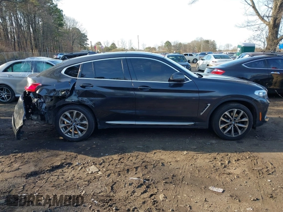 2019 BMW X4 xDrive30i with VIN 5UXUJ3C51KLG52460, listed as a IAAI auction lot 41906197 with 174,938 mi miles and . Bid and sale history available at DreamBid. Image 13.