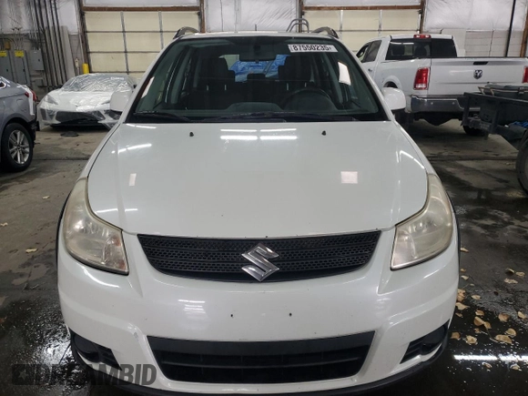 2007 Suzuki SX4 z VIN JS2YB413375101209, wystawiony jako Copart lot #87550235 z przebiegiem 167 788 mil mil oraz Szkoda całkowita • Salvage title. Historia ofert i sprzedaży dostępna na DreamBid. Obrazek 5.