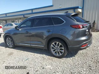 2017 Mazda CX-9 Grand Touring with VIN JM3TCADY0H0130082, listed as a Copart auction lot 56464384 with 115,078 mi miles and Salvage title. Bid and sale history available at DreamBid. Image 2.