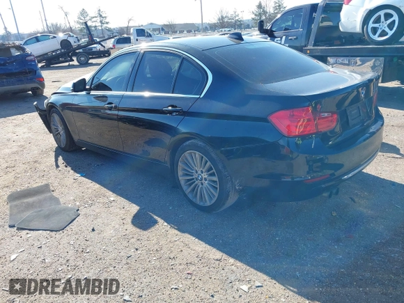 2014 BMW 3 Series 328i with VIN WBA3A5G5XENP31082, listed as a IAAI auction lot 41290680 with Not Provided miles. Bid and sale history available at carsss.com. Image 3.