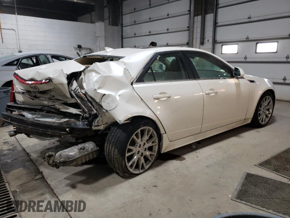 2013 Cadillac CTS Premium z VIN 1G6DS5E3XD0101681, wystawiony jako Copart lot #41334385 z przebiegiem 49 646 mil mil oraz Szkoda całkowita • Salvage title. Historia ofert i sprzedaży dostępna na DreamBid. Obrazek 3.