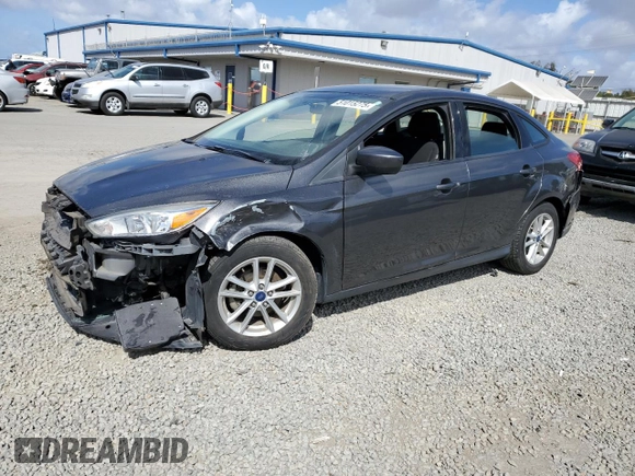 2018 Ford Focus SE with VIN 1FADP3F24JL231626, listed as a Copart auction lot 51015275 with 97,054 mi miles and Salvage Title. Bid and sale history available at carsss.com. Image 1.