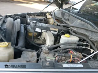 2005 Dodge 2500 SLT z VIN 3D7KS28C15G778863, wystawiony jako IAAI lot #42520642 z przebiegiem 193 811 mil mil oraz . Historia ofert i sprzedaży dostępna na DreamBid. Obrazek 19.