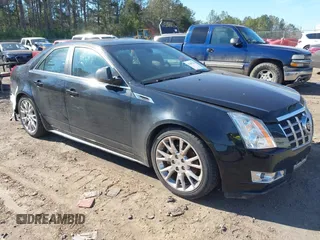 2013 Cadillac CTS Premium with VIN 1G6DP5E33D0163053, listed as a IAAI auction lot 41399126 with 138,293 mi miles and . Bid and sale history available at DreamBid. Image 1.