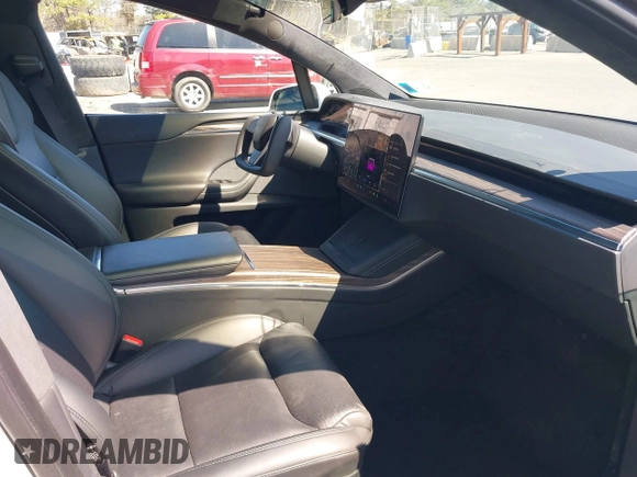 2022 Tesla Model X with VIN 7SAXCDE58NF342776, listed as a IAAI auction lot 42042369 with 70,301 mi miles and . Bid and sale history available at DreamBid. Image 5.