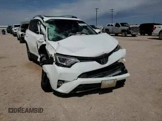 2018 Toyota RAV4 XLE with VIN JTMWFREV9JJ187834, listed as a Copart auction lot 56125505 with Not provided miles and Salvage title. Bid and sale history available at DreamBid. Image 14.