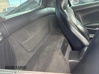 2021 Audi R8 z VIN WUAKBAFX7M7900472, wystawiony jako Copart lot #58422395 z przebiegiem 6493 mil mil oraz Szkody całkowita. Historia ofert i sprzedaży dostępna na DreamBid. Obrazek 6.