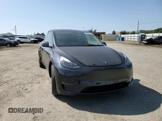 2024 Tesla Model Y Long Range with VIN 7SAYGAEE2RF101616, listed as a Copart auction lot 62236425 with 32,619 mi miles and Salvage title. Bid and sale history available at DreamBid. Image 14.