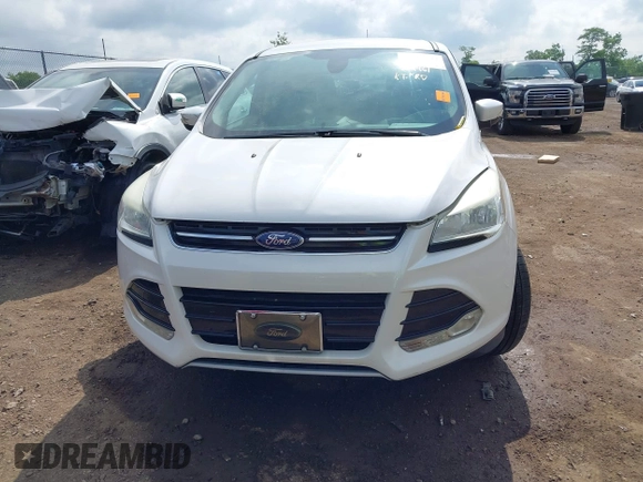 2013 Ford Escape SEL with VIN 1FMCU9HX6DUB14053, listed as a IAAI auction lot 42361297 with 144,861 mi miles and . Bid and sale history available at DreamBid. Image 12.