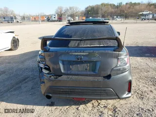 2014 Scion tC with VIN JTKJF5C74E3083312, listed as a IAAI auction lot 41730086 with 118,124 mi miles. Bid and sale history available at carsss.com. Image 16.