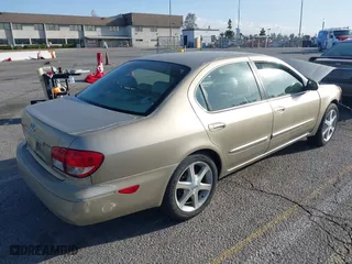 2002 Infiniti I35 Luxury with VIN JNKDA31A52T027346, listed as a IAAI auction lot 41709863 with 227,266 mi miles. Bid and sale history available at carsss.com. Image 4.