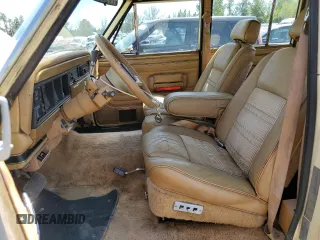 1988 Jeep Grand Wagoneer с VIN 1JCNJ15U2JT222901, выставлен на аукционе Copart как лот 55972745 с пробегом 157 856 миль миль и Чистый • Clean title. История ставок и продаж доступна на DreamBid. Изображение 7.