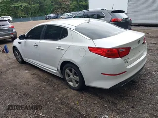2015 Kia Optima LX with VIN KNAGM4A7XF5599309, listed as a IAAI auction lot 42493215 with 143,703 mi miles and . Bid and sale history available at DreamBid. Image 3.