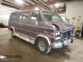1992 Chevrolet Chevy Van z VIN 2GBEG25K3N4150299, wystawiony jako Copart lot #74099444 z przebiegiem 156 341 mil mil oraz Tytuł czysty. Historia ofert i sprzedaży dostępna na DreamBid. Obrazek 4.