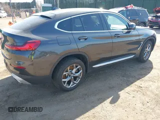 2024 BMW X4 xDrive30i with VIN 5UX33DT05R9X55093, listed as a IAAI auction lot 41811703 with 11,319 mi miles. Bid and sale history available at carsss.com. Image 4.