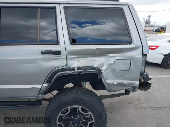 2000 Jeep Cherokee z VIN 1J4FF48S1YL200458, wystawiony jako IAAI lot #42239282 z przebiegiem Nie podano mil oraz . Historia ofert i sprzedaży dostępna na DreamBid. Obrazek 6.