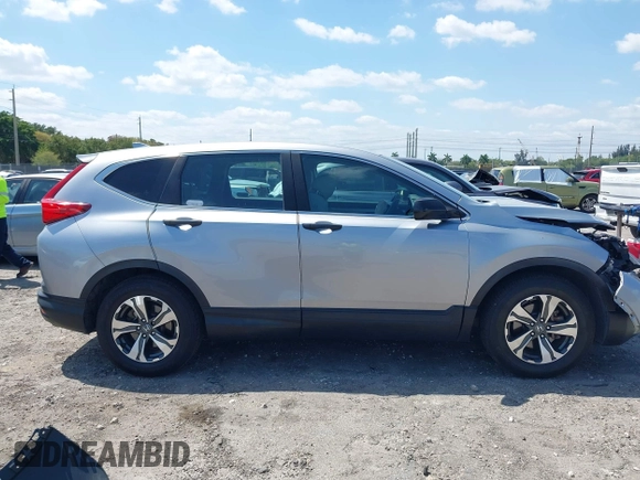 2019 Honda CR-V LX with VIN 2HKRW5H31KH411771, listed as a IAAI auction lot 42060193 with 175,036 mi miles and . Bid and sale history available at DreamBid. Image 13.